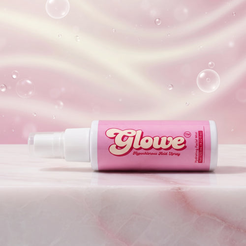 Glowe Hydrating Facial Mist 125 mL bottle lying on pink marble with bubbles